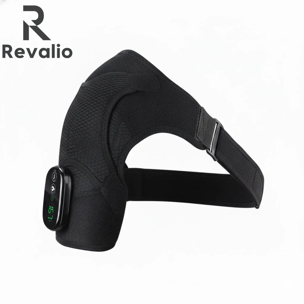 Side view of the Revalio Heated Shoulder Massager Brace with curved shoulder support adjustable belt and attached digital control unit against a white background with logo.
