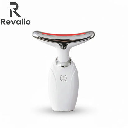 Front view of the white Revalio LED Facial Neck Massager standing upright against a white background.