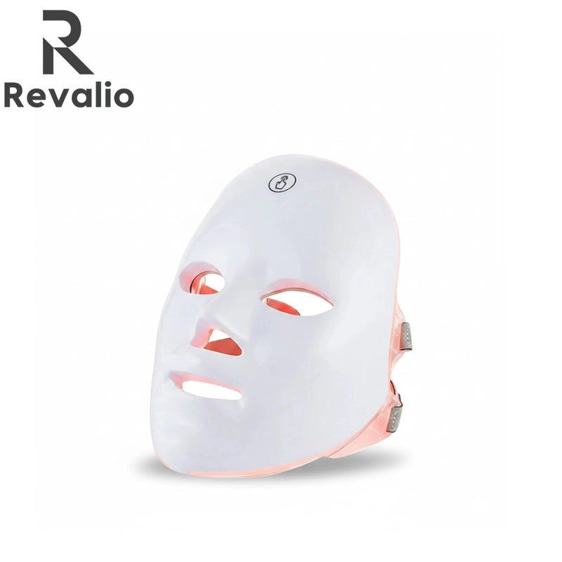 Revalio LED Red Light Face Mask shown at a front angle against a white background highlighting the eye and mouth openings.